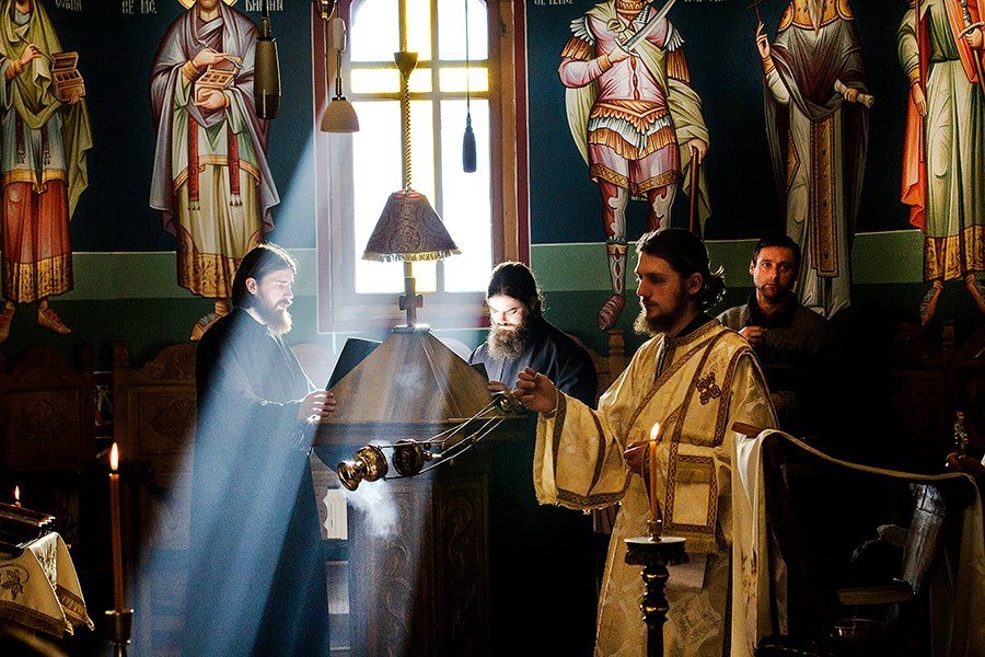 religious-service-at-orthodox-church-priests-romanian-men-bucovina-romania